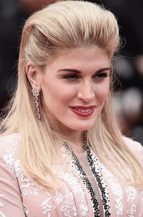 An interesting, vampire-ish do from the TV host and model at the closing ceremony of the 68th Cannes film festival. She’s even gone for a pale foundation and some devilish red lips to complete the look.