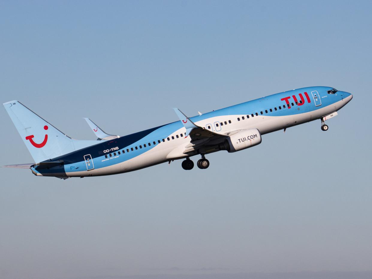 TUI Airlines Belgium Boeing 737-800 aircraft as seen departing from Eindhoven Airport