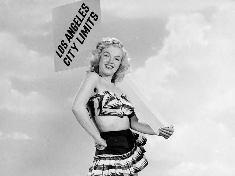 American film star Marilyn Monroe (1926 - 1962) arrives at the Los Angeles city limits, ready to take Hollywood by storm.