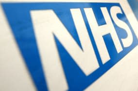 Embargoed to 0001 Wednesday February 12File photo dated 07/12/10 of a general view of an NHS logo. It is unclear what billions of pounds of NHS savings have been spent on, MPs have said. PRESS ASSOCIATION Photo. Issue date: Wednesday February 12, 2014. While the NHS has managed to create substantial