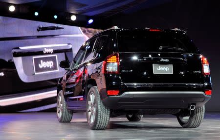 The 2014 Jeep Compass is unveiled at the North American International Auto Show in Detroit, Michigan, in this file photo taken January 14, 2013. REUTERS/James Fassinger/Files