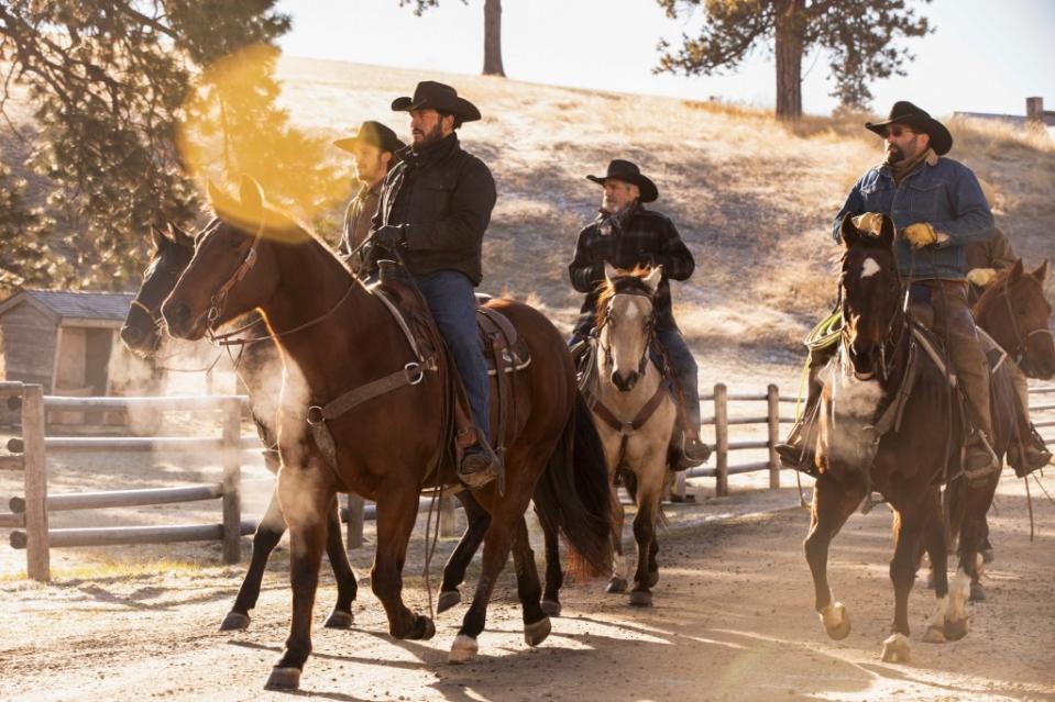 Luke Grimes (left) and Hauser (center) on “Yellowstone.” Emerson Miller / Paramount Network / courtesy Everett Collection