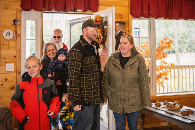 <p>The Home Depot Foundation</p> Jonathan and Samantha Turnbull and family look around their renovated home