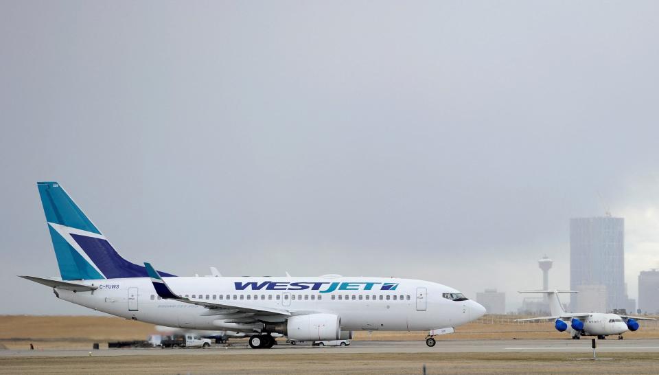 A Westjet Boeing 737-700 takes off at the International Airport in Calgary, Alberta, May 3, 2011.