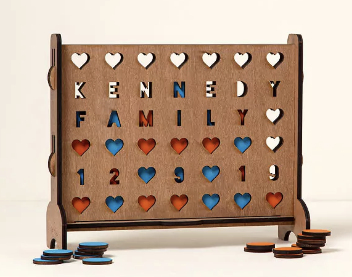 <p><a href="https://go.redirectingat.com?id=74968X1596630&url=https%3A%2F%2Fwww.uncommongoods.com%2Fproduct%2Fpersonalized-hearts-four-across-game&sref=https%3A%2F%2Fwww.womansday.com%2Frelationships%2Ffamily-friends%2Fg3271%2Fgifts-for-pregnant-women%2F" rel="nofollow noopener" target="_blank" data-ylk="slk:Shop Now;elm:context_link;itc:0;sec:content-canvas" class="link rapid-noclick-resp">Shop Now</a></p><p>Personalized Four Hearts Across Game </p><p>Uncommon Goods </p><p>$90.00</p>