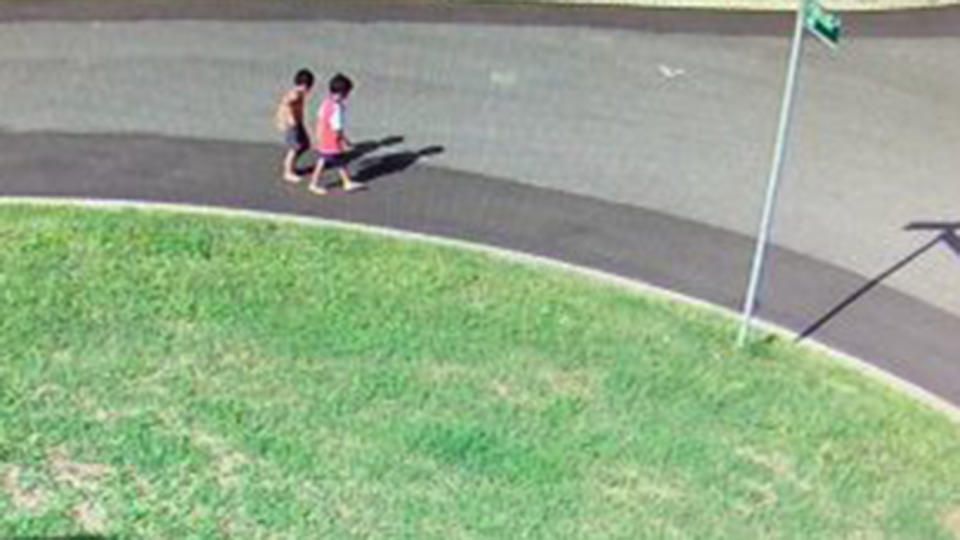 The two boys were seen on CCTV walking along Brett Street in the Townsville suburb of Cranbrook towards the Ross River. Source: Qld Police