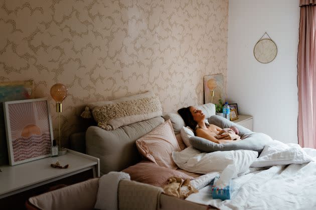 The author and her baby in bed. (Photo: Photo by Caro Cuinet Wellings)