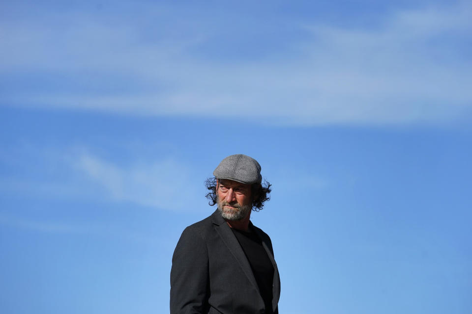 Troy Kotsur, nominated for an Oscar for best supporting actor for his role in the film "CODA," poses for a photo at Red Rock Park in Mesa, Ariz., on Jan. 28, 2022. (AP Photo/Matt York)