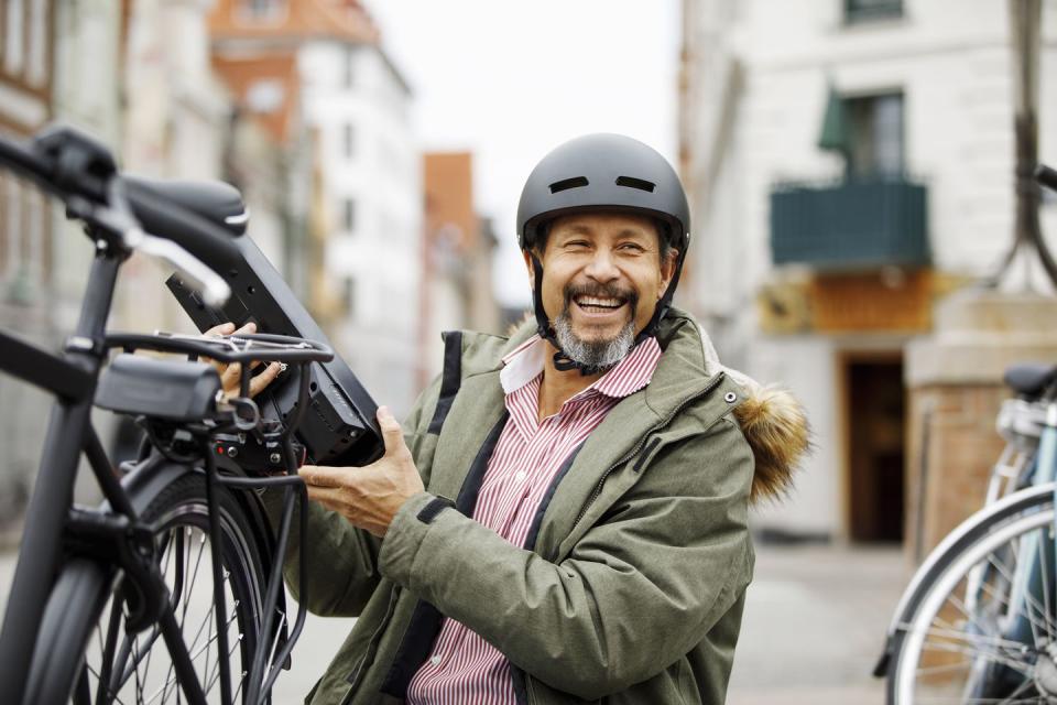 smiling man is so happy with bicycle