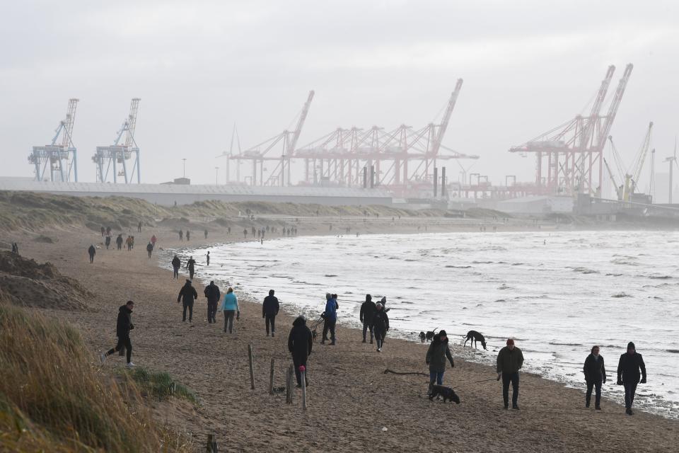 Walkers on the beach at Crosby, Merseyside
Credit: Liverpool Echo