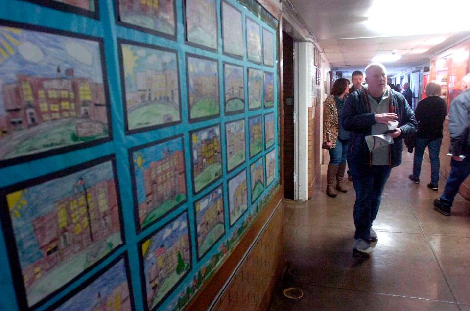 Student drawings of Hillsdale Elementary line the hallway walls as former students and staff toured the building on Saturday, March 11, 2023.