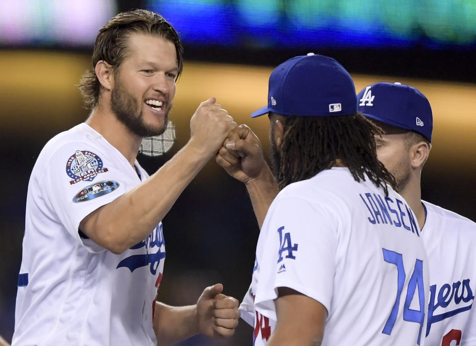 Los Angeles Dodgers pitchers Clayton Kershaw (left) and Kenley Jansen are doing all they can to snap the franchise's 30-year World Series drought. (AP)