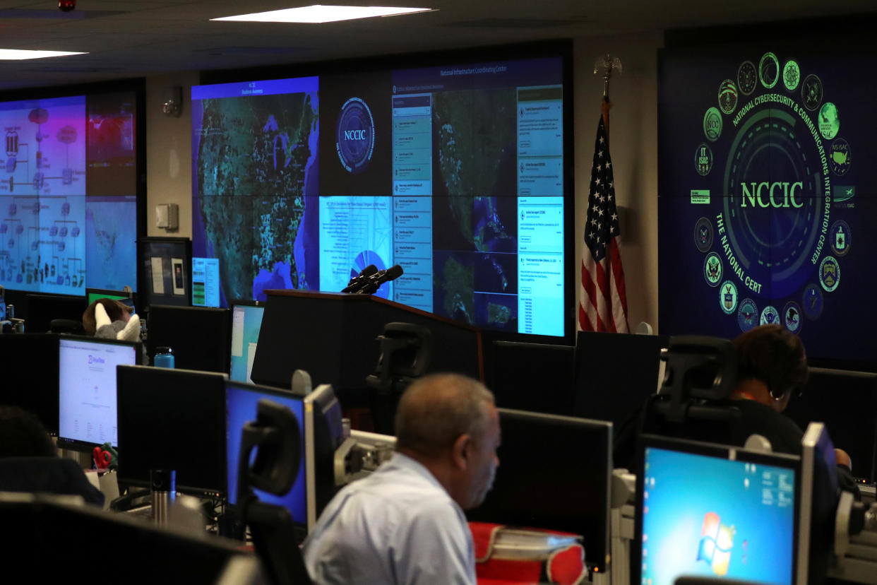 U.S. Department of Homeland Security elections security workers monitor screens in the DHS National Cybersecurity and Communications Integration Center (NCCIC) in Arlington, Virginia, U.S. November 6, 2018. REUTERS/Jonathan Ernst