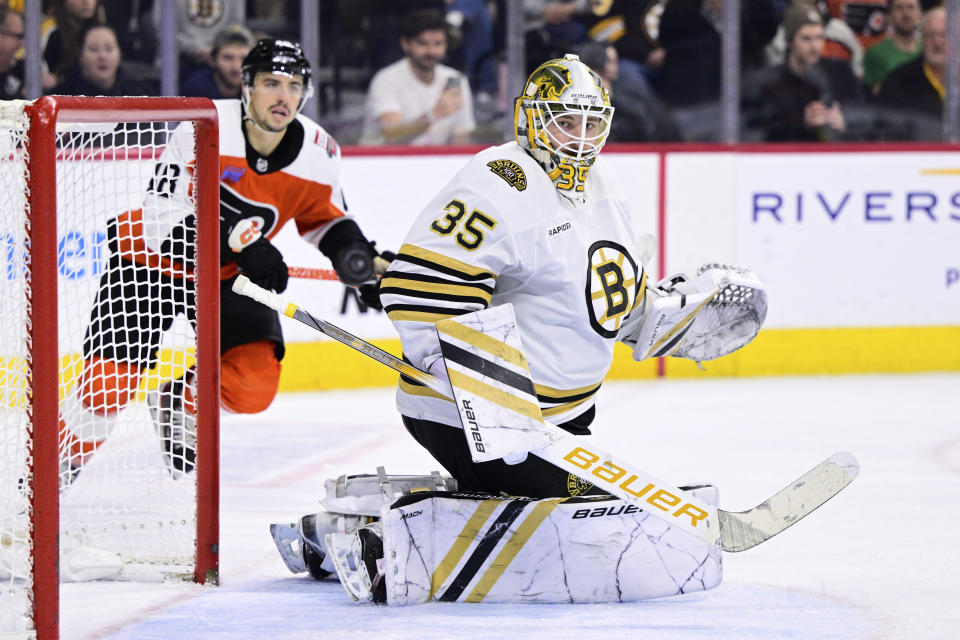 Boston Bruins goaltender Linus Ullmark watches the puck after making a save during the second period of an NHL hockey game against the Philadelphia Flyers, Saturday, Jan. 27, 2024, in Philadelphia. (AP Photo/Derik Hamilton)