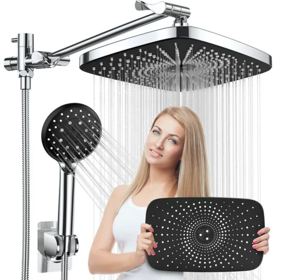 Woman holding a showerhead with two different shower fixtures in the background