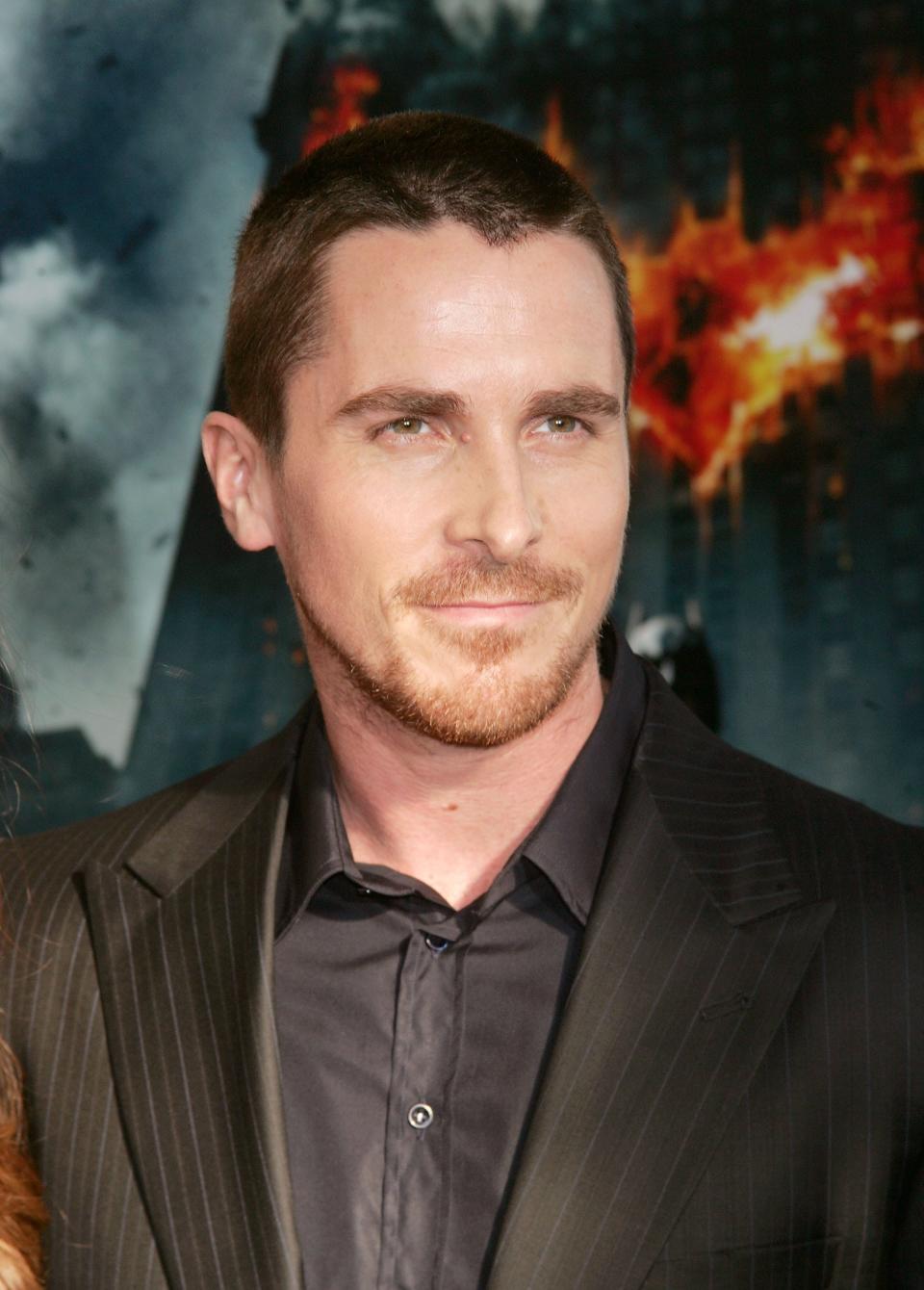Christian Bale in a black suit