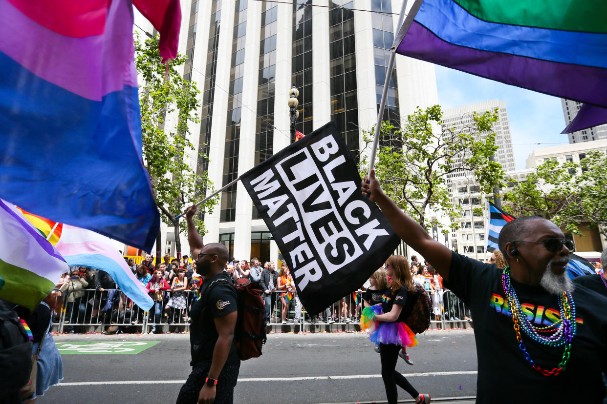 The Black Lives Matter and LGBTQ equality movements must support each other, note activists at the start of LGBTQ Pride Month. Here, in a scene from San Francisco Pride 2017, the messages intermingled. (Photo: Elijah Nouvelage/Getty Images)