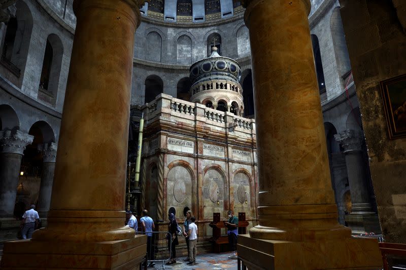 FILE PHOTO: People visit the Church of the Holy Sepulchre in Jerusalem's Old City