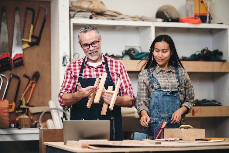 Two happy comrade carpenters