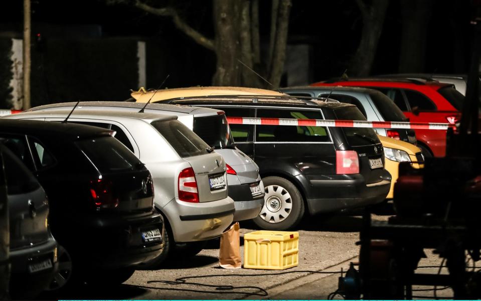 Traces of the explosion are seen on cars - Credit: Maja Hitij/Getty