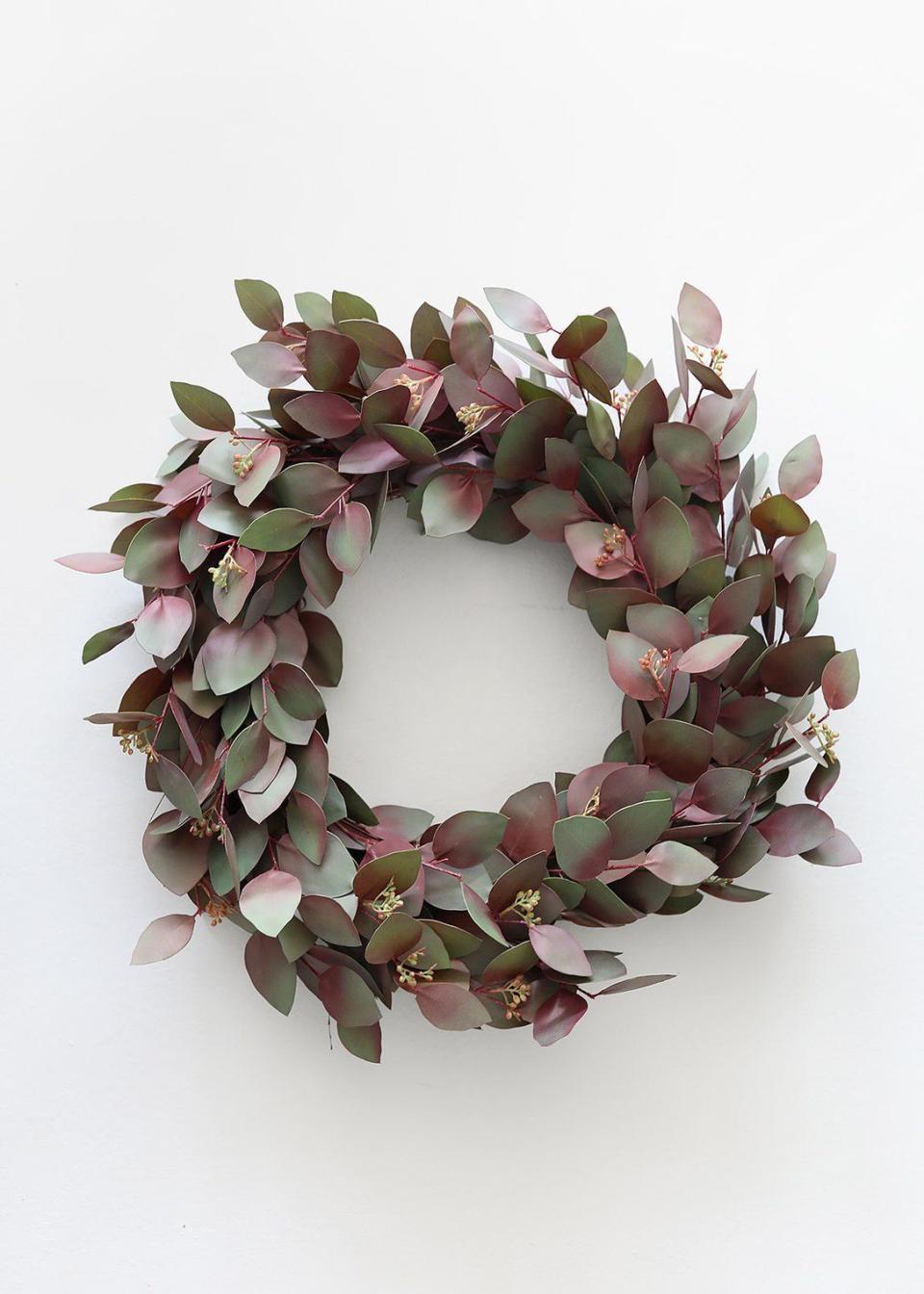 <p><strong>AFloral</strong></p><p>afloral.com</p><p><strong>$88.00</strong></p><p><a href="https://www.afloral.com/products/burgundy-green-real-touch-seeded-eucalyptus-wreath-24" rel="nofollow noopener" target="_blank" data-ylk="slk:Shop Now;elm:context_link;itc:0;sec:content-canvas" class="link ">Shop Now</a></p><p>Burgundy-tinged seeded eucalyptus leaves echo the gorgeous autumnal hues of the season. And an added bonus: its faux leaves means it will last for years to come.</p>