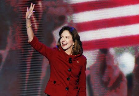 U.S. Senator Kay Hagan (D-NC) waves before addressing the final session of the Democratic National Convention in Charlotte, North Carolina, in this photo taken September 6, 2012. REUTERS/Jason Reed/Files