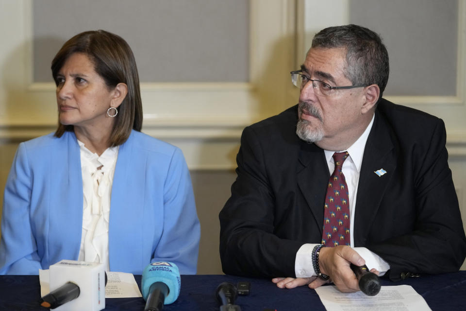 President-Elect Bernardo Arevalo, right, and his Vice President Karin Herrera listen to a question during a press conference in Guatemala City, Monday, Aug. 28, 2023. The Central American country's top electoral tribunal declared Arevalo the winner of the presidential election just hours after another part of the government suspended his Seed Movement party. (AP Photo/Moisés Castillo)