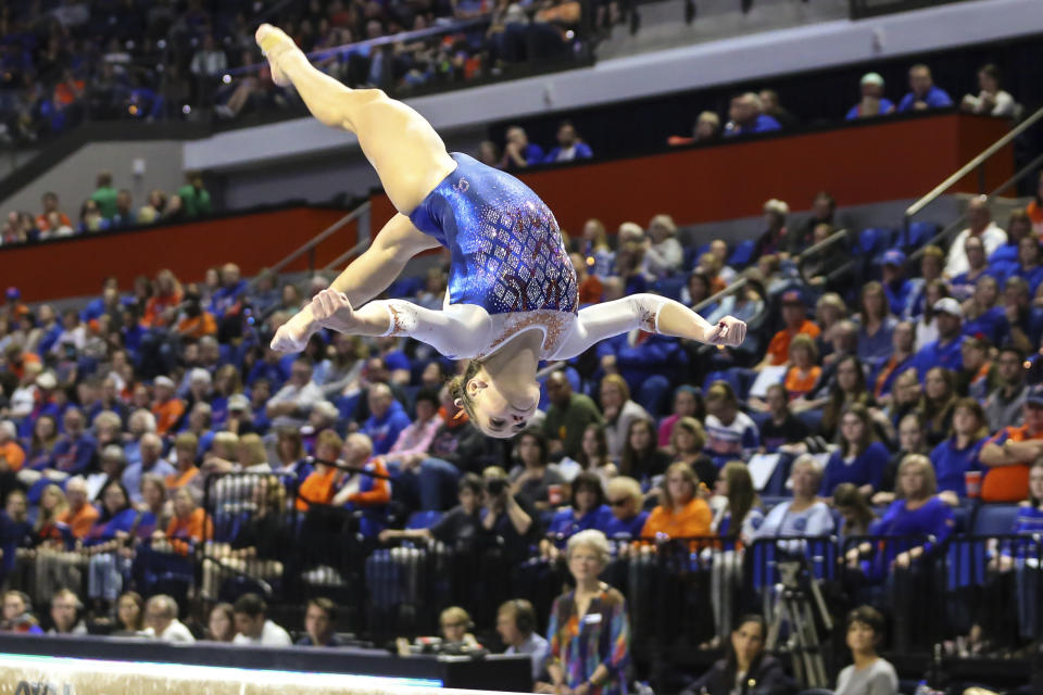 Florida's Rachel Gowey competes on the balance beam during an NCAA gymnastics match against Missouri, Friday, Jan. 11, 2019, in Gainesville, Fla. (AP Photo/Gary McCullough)