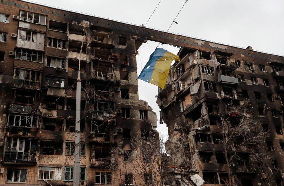 Destroyed apartment block in Mariupol (REUTERS)