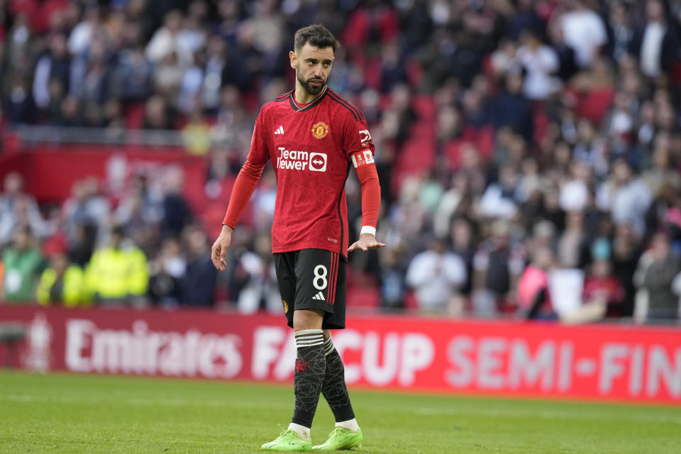 Manchester United's Bruno Fernandes reacts during a penalty shootout at the end of the English FA Cup semifinal soccer match between Coventry City and Manchester United at Wembley stadium in London, Sunday, April 21, 2024. (AP Photo/Alastair Grant)