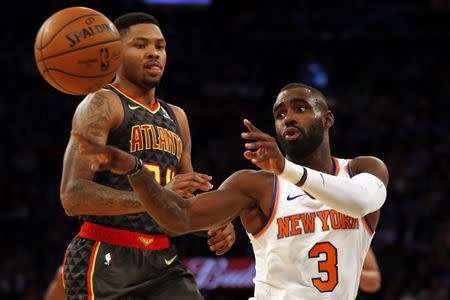 Oct 17, 2018; New York, NY, USA; New York Knicks guard Tim Hardaway Jr. (3) passes the ball in front of Atlanta Hawks guard Kent Bazemore (24) during the second half at Madison Square Garden. Mandatory Credit: Adam Hunger-USA TODAY Sports