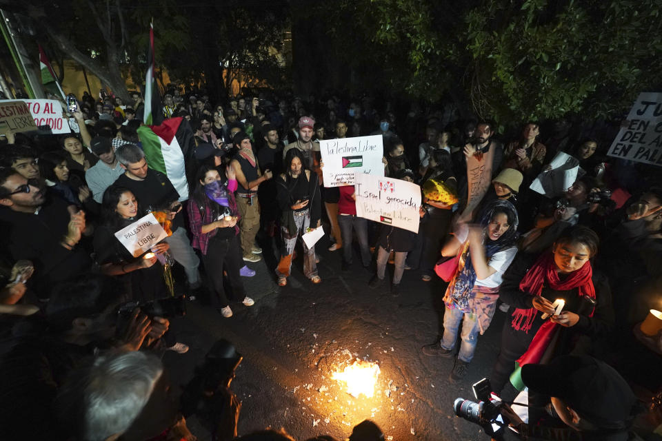 Palestinian supporters protest outside the Israeli embassy in Mexico City, Friday, Oct. 20, 2023. (AP Photo/Marco Ugarte)
