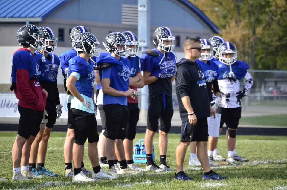 Centerville football coach Ryan Cole and players look on during practice ahead of the team's first round sectional game against Lawrenceburg, Wednesday, Oct. 18, 2023.