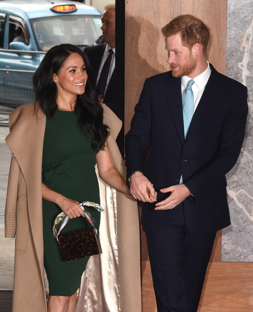 Meghan debuted a new trendy handbag at the awards. [Photo: Getty]