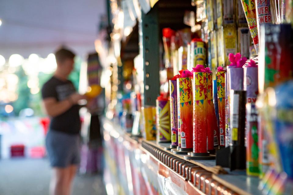 Shelves of fireworks await purchase at the Factory Fireworks Outlet at the corner of International Way and Gateway Street in Springfield. 