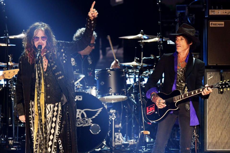 LOS ANGELES, CALIFORNIA - JANUARY 26: (L-R)  Steven Tyler and Joe Perry of music group Aerosmith perform onstage during the 62nd Annual GRAMMY Awards at STAPLES Center on January 26, 2020 in Los Angeles, California. (Photo by Kevin Winter/Getty Images for The Recording Academy )