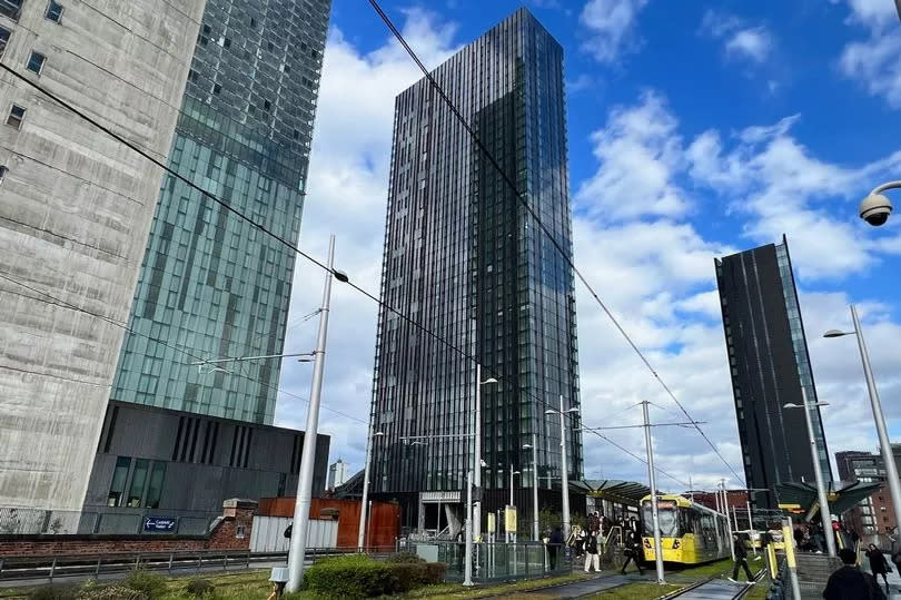 Viadux Phase One in Manchester city centre towers over Deansgate-Castlefield Metrolink stop, with Beetham Tower to the left
