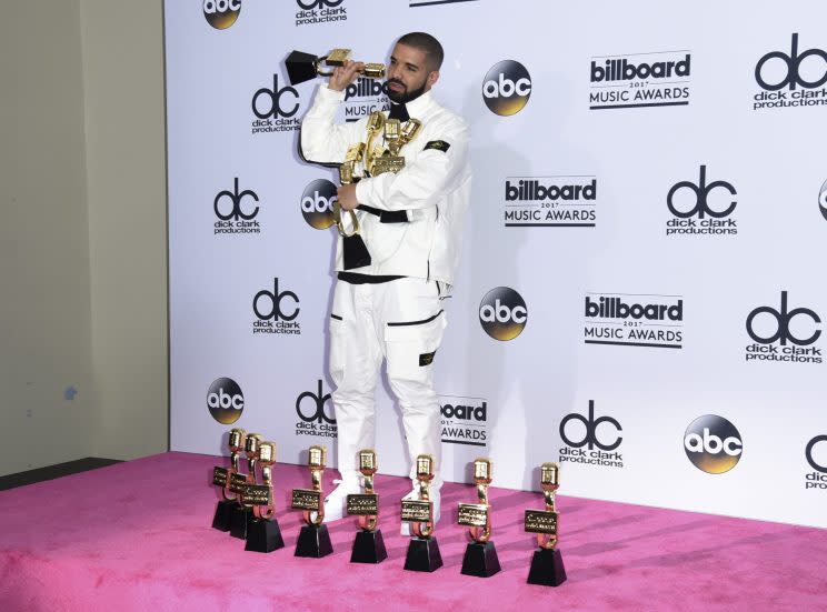 Drake celebrates his record-breaking night at the Billboard Music Awards.