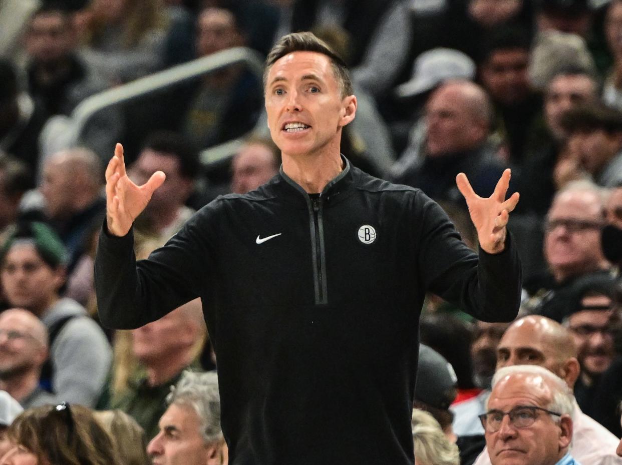 Brooklyn Nets head coach Steve Nash calls a play against the Milwaukee Bucks at Fiserv Forum.