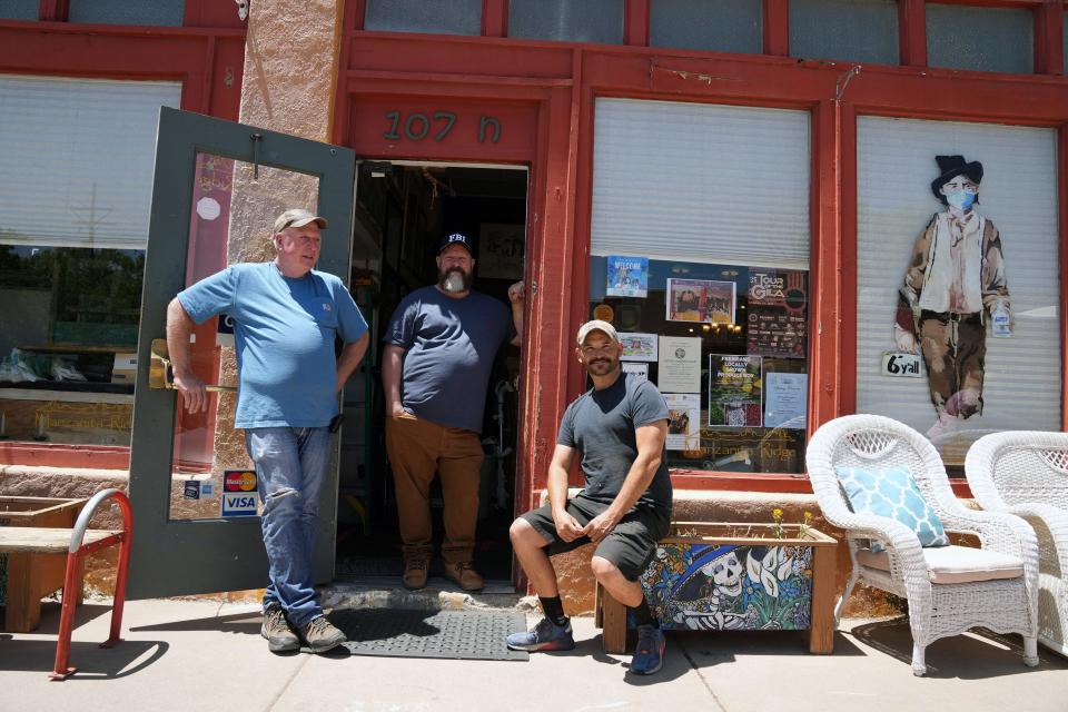 From left, Rick Johnson, David Van Auker and Buck Burns, owners of Manzanita Ridge, a furniture and antique store in Silver City, New Mexico.