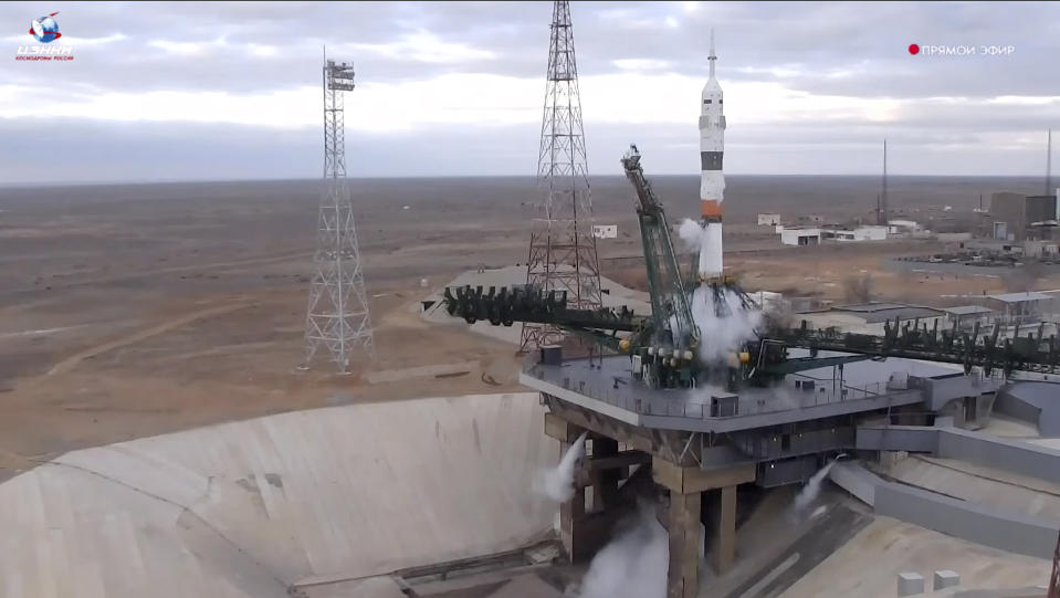 In this photo taken from video released by Roscosmos space corporation, the Soyuz-2.1a rocket booster with Soyuz MS-25 space ship carrying a new crew to the International Space Station, ISS, stands at the launch pad after cancellation of the launch at the Russian leased Baikonur cosmodrome, Kazakhstan, Thursday, March 21, 2024. Russia's Roscosmos space agency has aborted the launch of three astronauts to the International Space Station about 20 seconds before they were scheduled to lift off. Officials say the crew is safe. The Russian Soyuz rocket was to carry NASA astronaut Tracy Dyson, Oleg Novitsky of Roscosmos and Marina Vasilevskaya of Belarus from the Russia-leased Baikonur launch facility in Kazakhstan. (Roscosmos space corporation via AP)