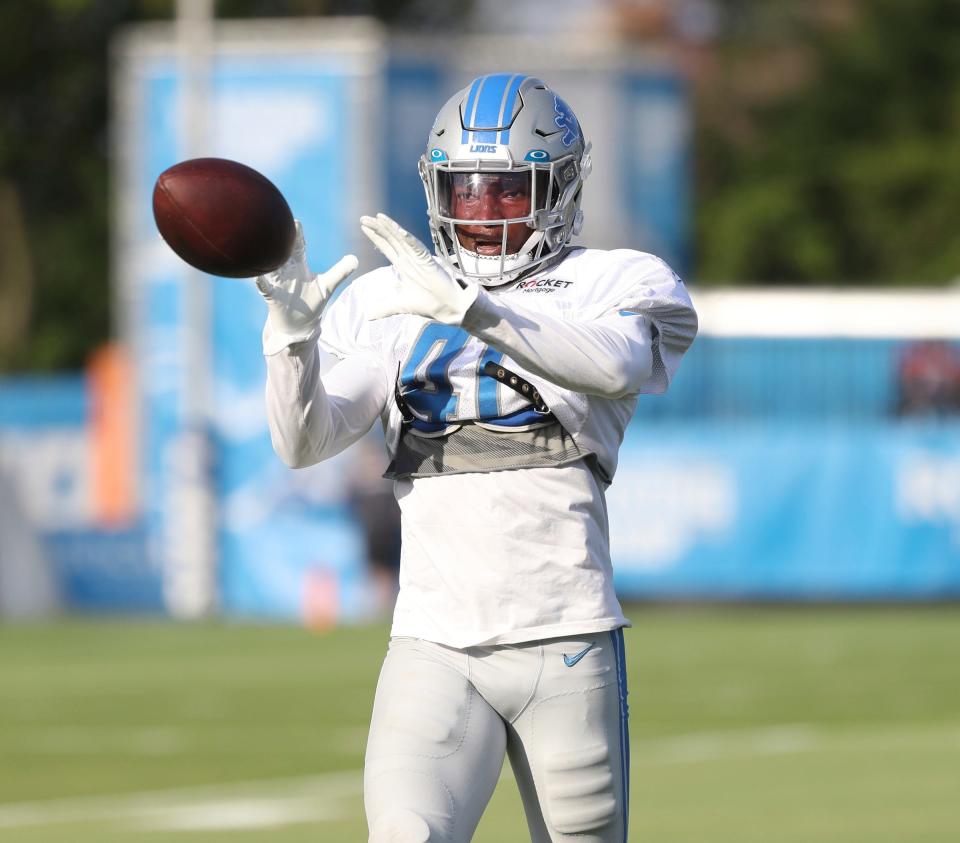 Lions linebacker Jarrad Davis goes through drills during practice on Aug. 1.