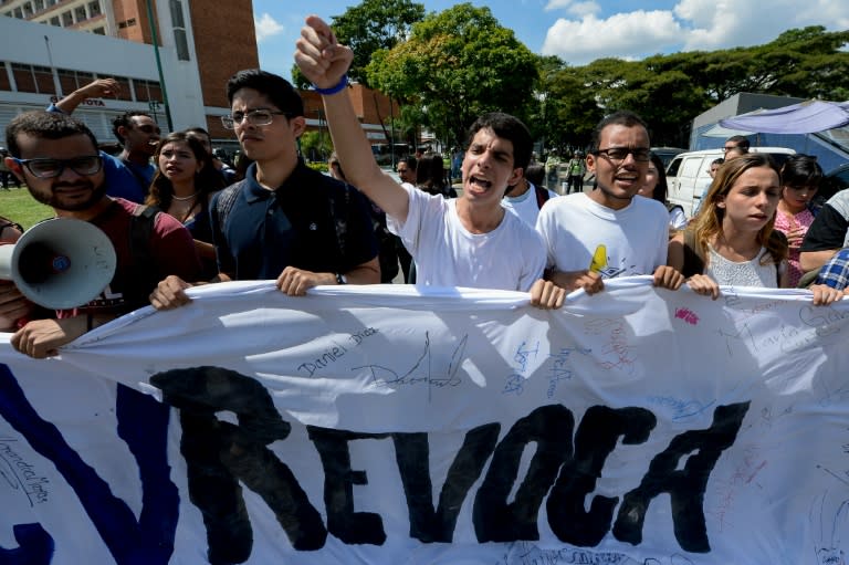 Students from the public Central University of Venezuela demonstrate in demand of the referendum on removing President Nicolas Maduro, in Caracas on October 21, 2016