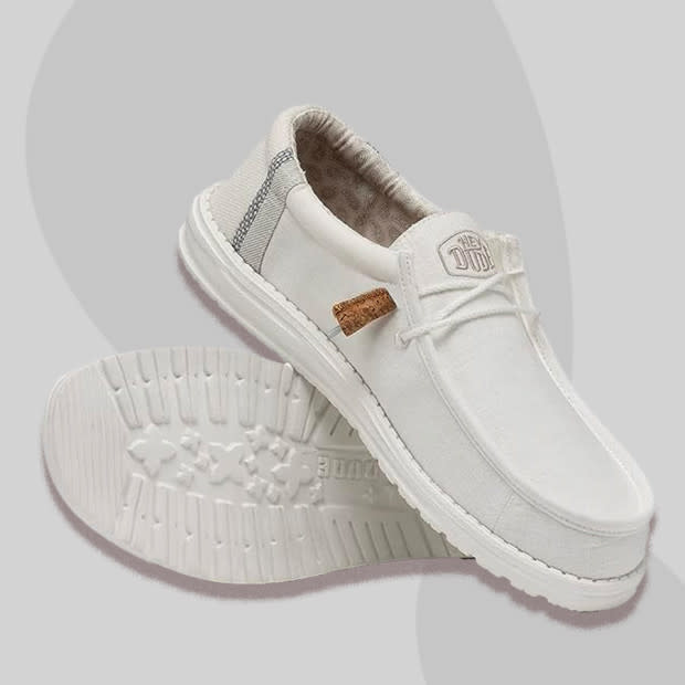 <p>Courtesy of Amazon</p><p>One of the best white sneakers for summer, the Hey Dude Wally is climbing the ranks of the most coveted <a href="https://www.mensjournal.com/style/15-best-slip-ons-men" rel="nofollow noopener" target="_blank" data-ylk="slk:slip-on shoes for men;elm:context_link;itc:0" class="link ">slip-on shoes for men</a>. They’ve been encroaching on the Vans Slip-On and Sperry A/O territory for a few years and don’t seem to be slowing down — but, why?</p><p>The appeal is three-fold. These white sneakers are some of the lightest you’ll find at just six ounces. They’re also washable and travel-friendly with removable, cushioned insoles. But the primary draw is that they’re flexible enough to move with a foot and can even bend in half without breaking. </p><p>[$65; <a href="https://www.amazon.com/Hey-Dude-Loafers-Comfortable-Light-Weight/dp/B0B9WZKZ2C?th=1&psc=1&linkCode=ll1&tag=mj-bestwhitesneakers-amastracci-080723-update-20&linkId=98364032fa2018307c4ee665a0a94615&language=en_US&ref_=as_li_ss_tl" rel="nofollow noopener" target="_blank" data-ylk="slk:amazon.com;elm:context_link;itc:0" class="link ">amazon.com</a>]</p>