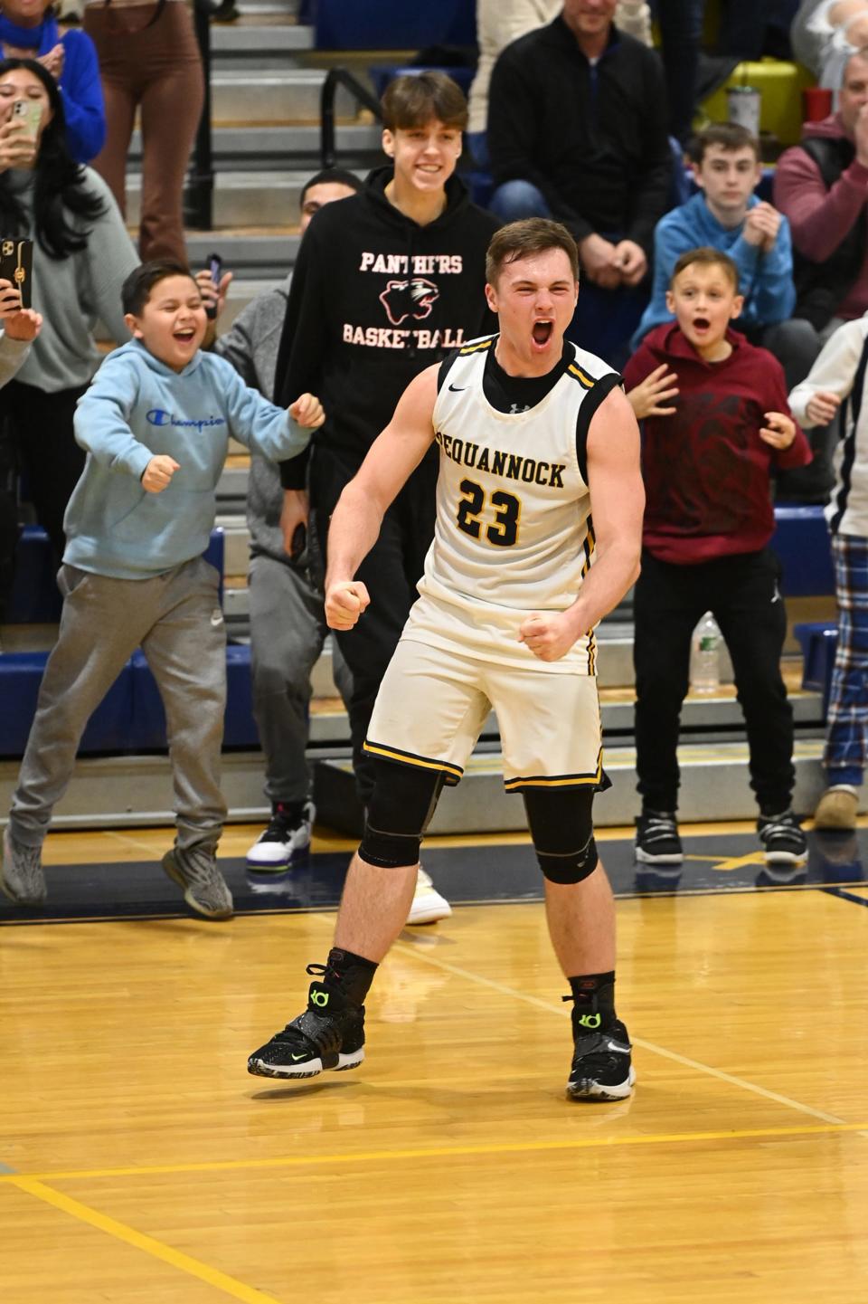 Pequannock junior guard Karson Culuko celebrates after scoring his 1,000th career point in the third quarter on Feb. 9, 2023.