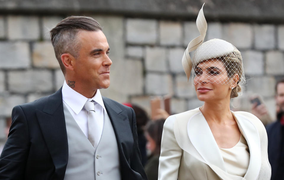 Robbie Williams and Ayda Field arrive ahead of the wedding of Princess Eugenie to Jack Brooksbank at St George's Chapel in Windsor Castle