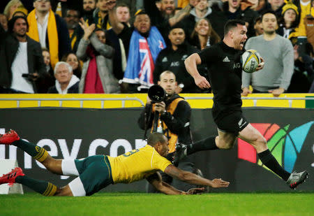 Australia Rugby Union - Bledisloe Cup - Australia's Wallabies v New Zealand All Blacks - Olympic Stadium, Sydney, Australia - 20/8/16 New Zealand's centre Ryan Crotty scores the first try as Australia's Will Genia attempts to tackle. REUTERS/Jason Reed