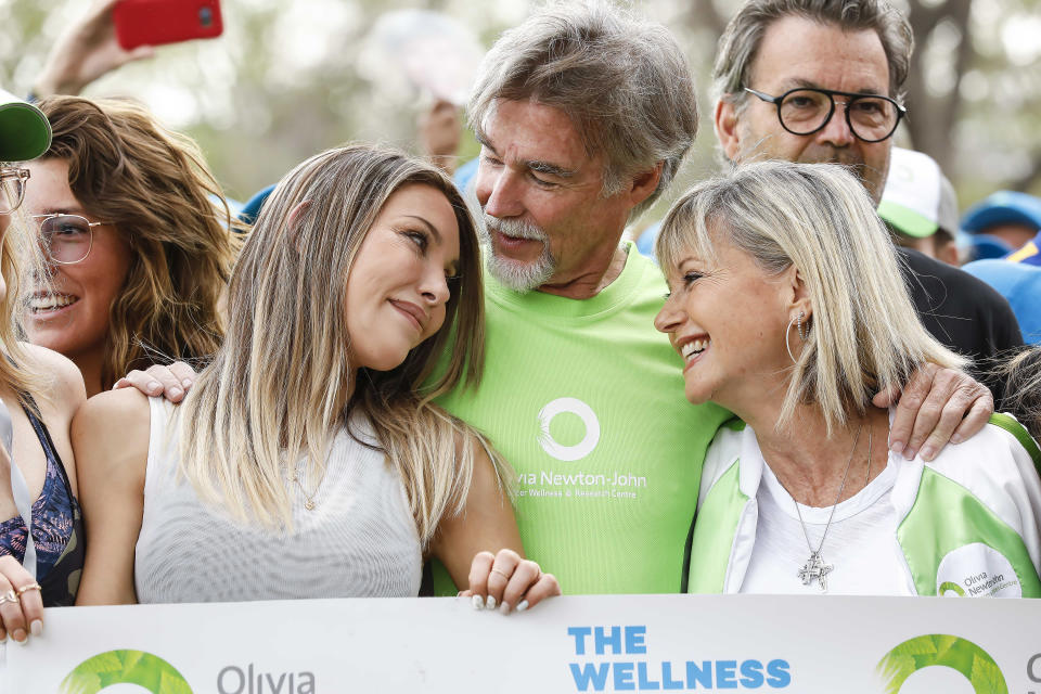 Chloe Lattanzi, John Easterling and  attends the Olivia Newton-John Wellness Walk and Research Run on October 06, 2019 in Melbourne, Australia. The event helps fund cancer research and provide access to world-leading wellness and support care programs for patients within the ONJ Centre. (Photo by Sam Tabone/WireImage)