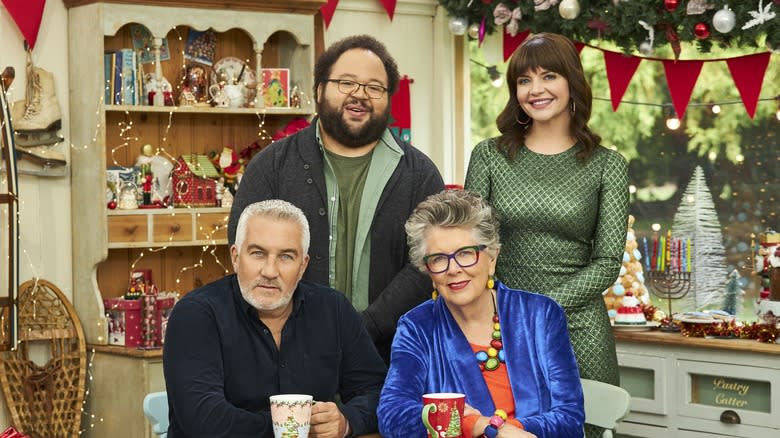 Zach Cherry, Casey Wilson, Prue Leith, and Paul Hollywood posing together