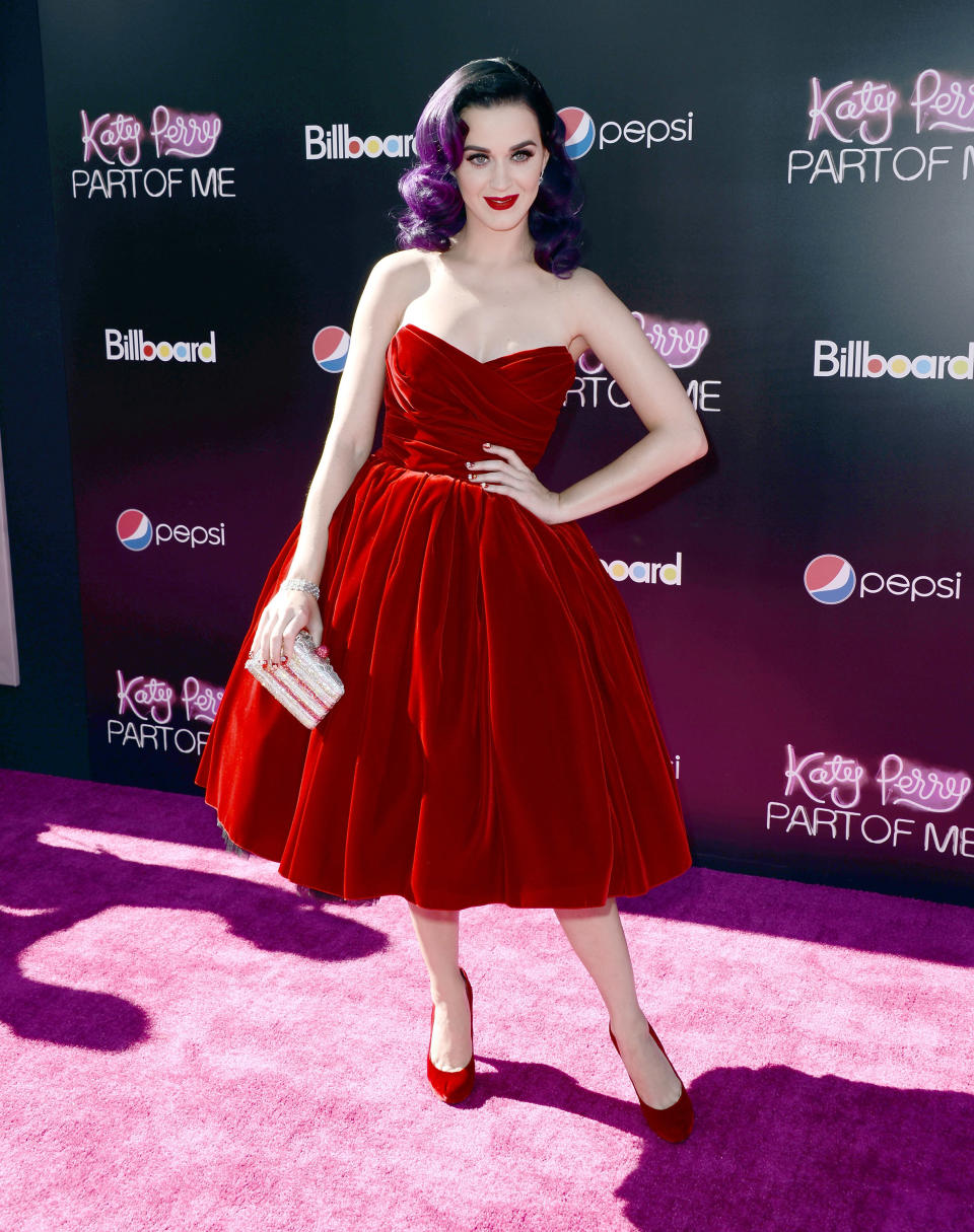 Wearing a velvet <a href="http://www.redcarpet-fashionawards.com/2012/06/27/katy-perry-in-dolce-gabbana-katy-perry-part-of-me-3d-la-premiere/" target="_blank">Dolce &amp; Gabbana</a> dress at the premiere of "Katy Perry: Part Of Me" at Grauman's Chinese Theatre on June 26, 2012 in Hollywood, California.